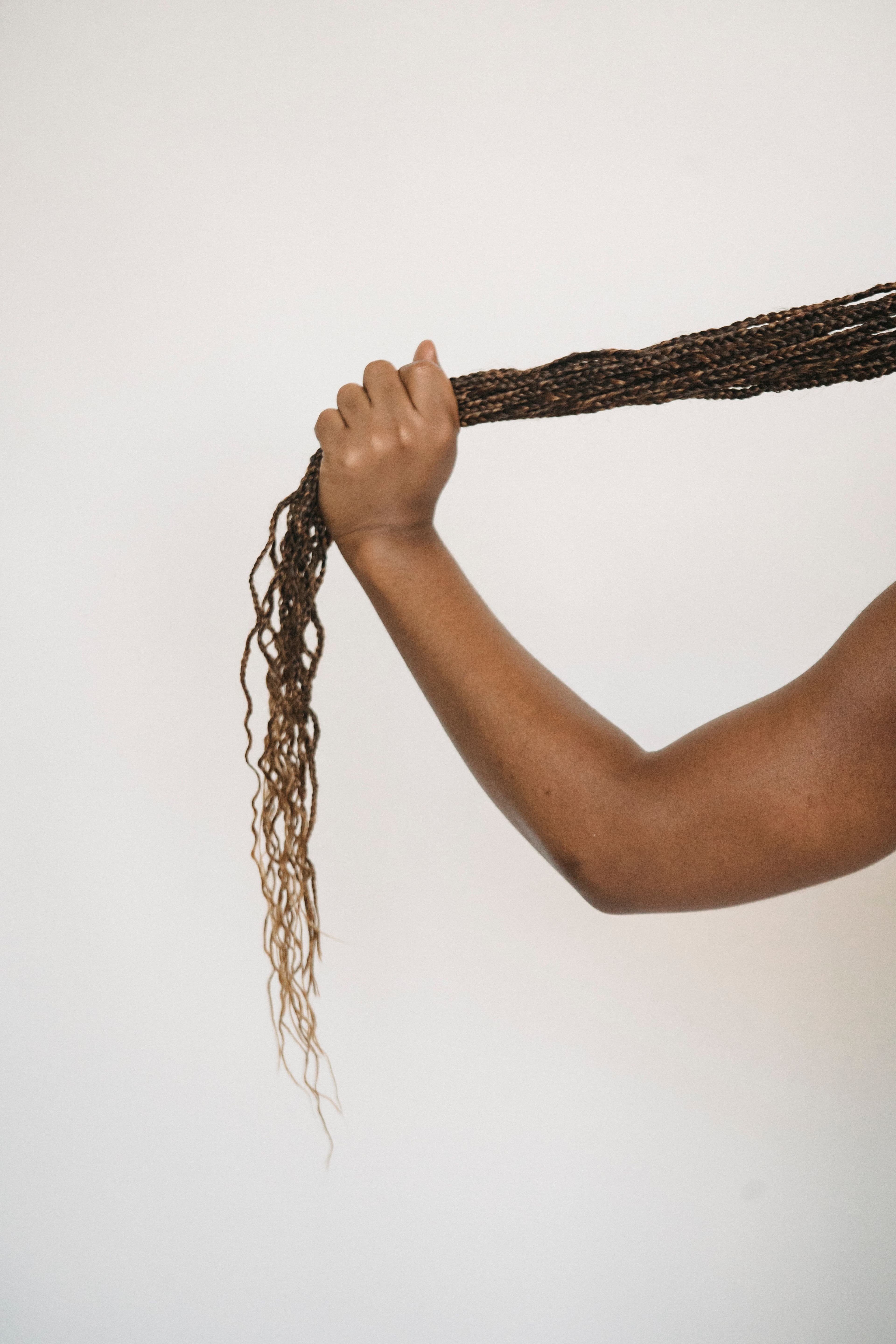 Your Natural Hair Still Needs Moisture — Even Under Braids